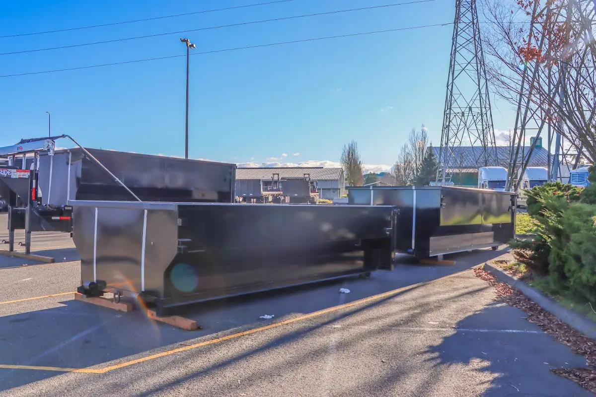 Roll-off dumpster ready for waste disposal at job site for Construction Dumpster Rental in Junction City